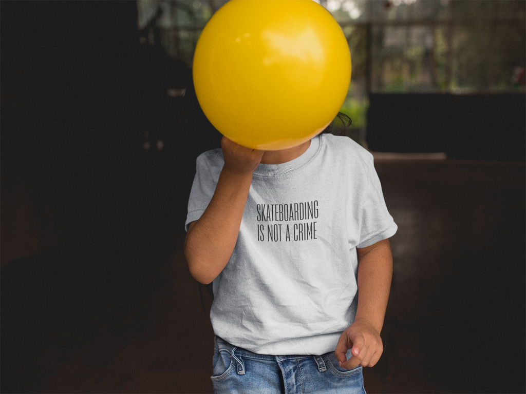 Skateboarding Is Not A Crime Infant Tee — Minimal Baby Skate Shirt
